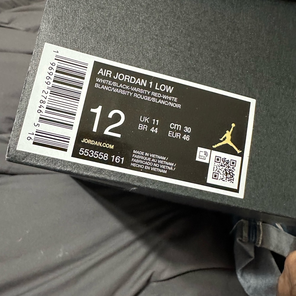 Jordan Air 1 Low in White, Black, and Red - Picture 5 of 14